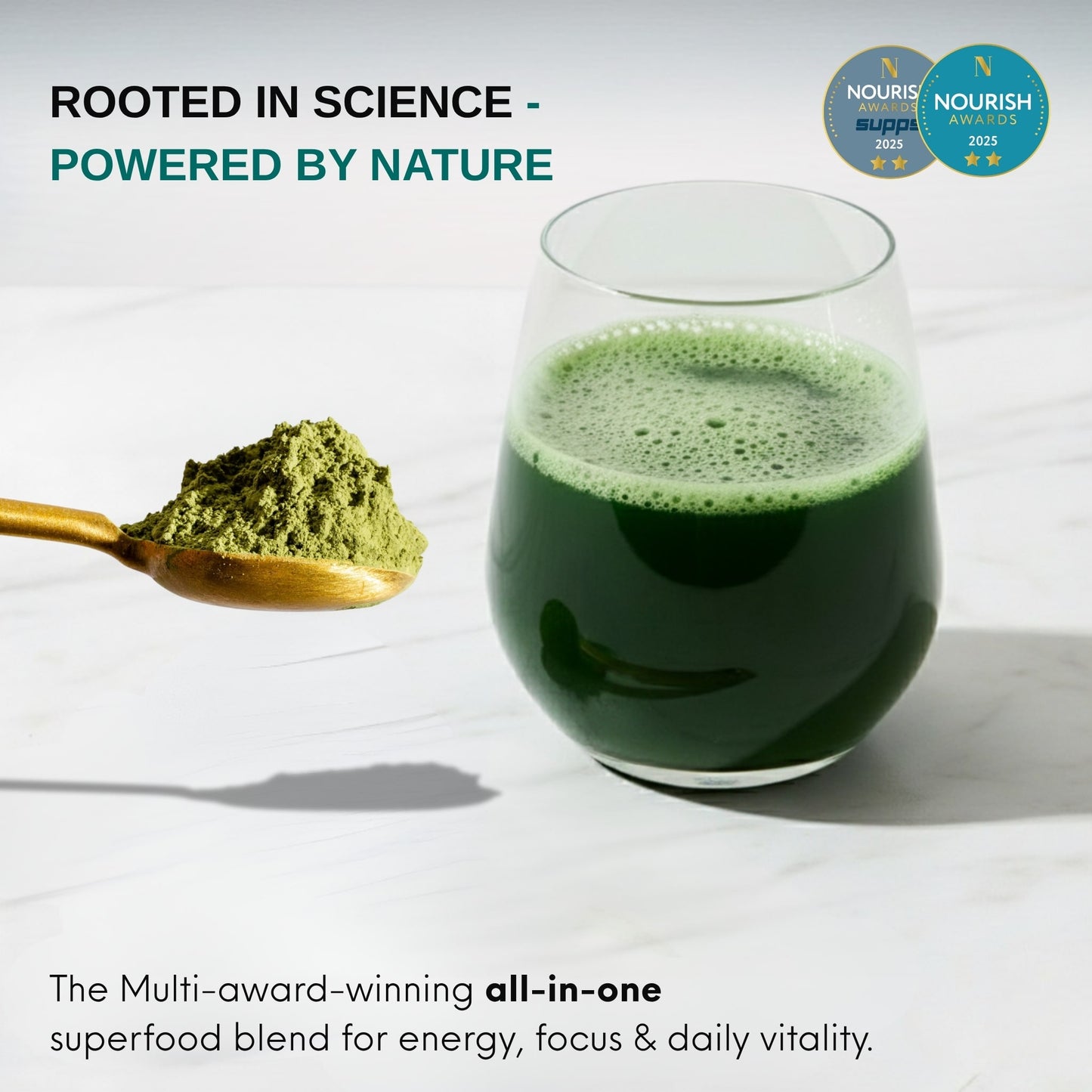 Green superfood powder in a spoon next to a glass of green juice on a light background, with 'Nourish' certification logos.