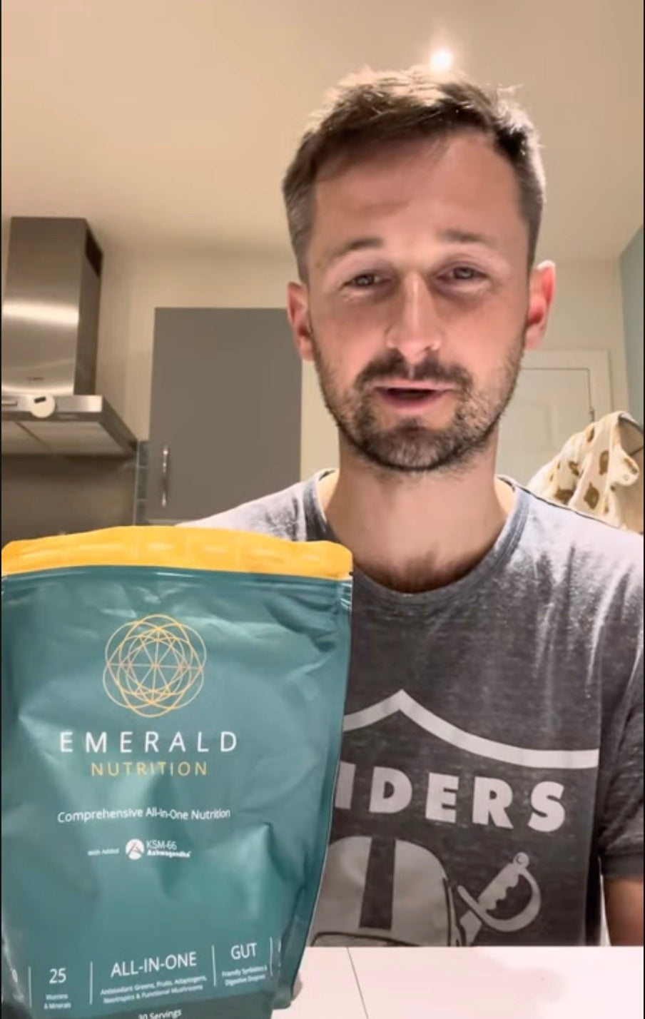 A man with a pouch of Emerald Nutrition