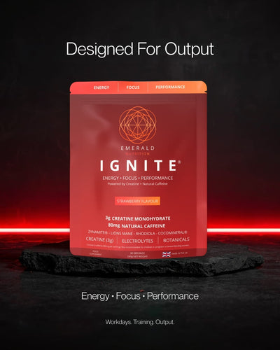 Pouch of Ignite on a black slate tile with red neon glow and some text